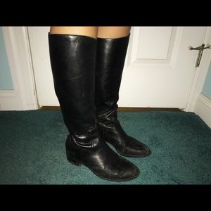 Black leather Franco Sarto boots.